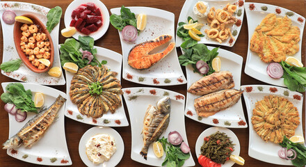 Fototapeta na wymiar different kinds of cooked fish; grilled, poached, pan-broiled, bake 