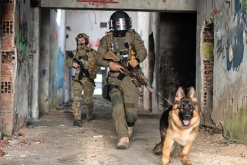 Modern Warfare Soldiers with military working dog in action on the battlefield. 