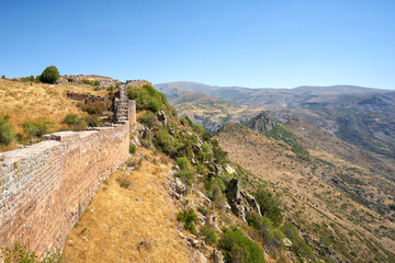 Fototapeta na wymiar Stone wall of Smbataberd fortress in Armenia