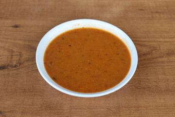 Soup is a primarily liquid food, generally served warm or hot (but may be cool or cold), that is made by combining ingredients of meat or vegetables with stock, milk, or water