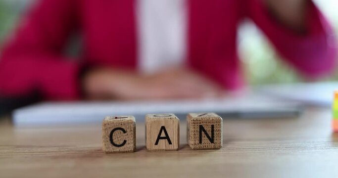 Businesswoman removes letter t in word cant