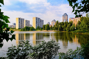 Obraz premium Modern buildings around the Verbne lake in the obolon district of Kiev, Ukraine