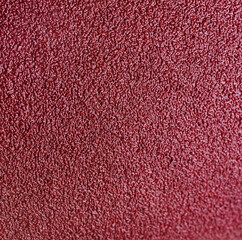 matte grungy sandpaper background closeup