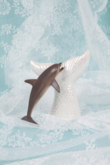 Dolphin and mermaid