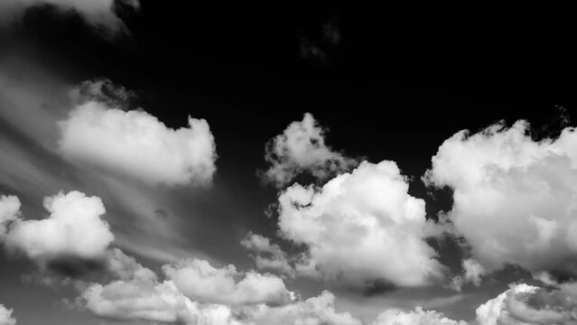 Cloudy sky timelapse. Black and white cumulus clouds moving fast. Storm cloudscape. Nature background. Windy thunderstorm weather forecast. Religion concept. Nature hurricane landscape. 4k video.