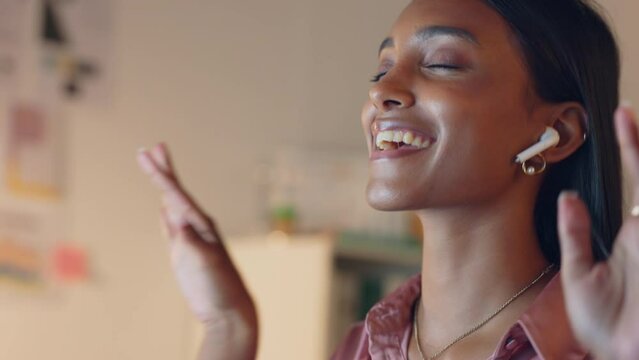 Music, dance and streaming with a young woman listening with earphones or earpods alone in her home. Radio, freedom and audio with an attractive young female enjoying an online playlist or track