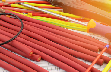 Electrical tools and materials for the installation of an electrical panel. Sunflare.