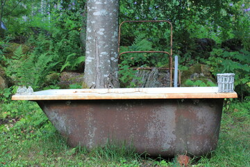 Old outdoors bathtub