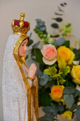 decoration with statue of our lady and flowers, ornamental flowers