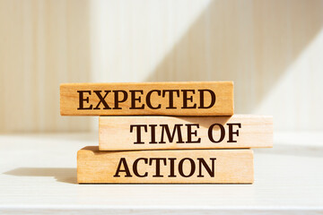 Wooden blocks with words 'Expected Time Of Action'. Business concept - obrazy, fototapety, plakaty