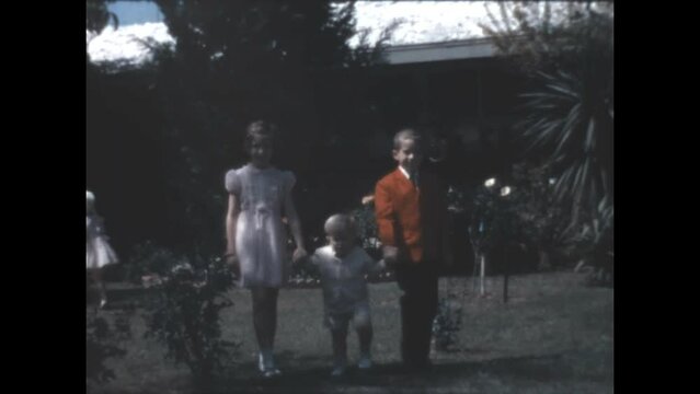 Easter Best 1966 - Siblings model their Easter outfits in Canoga Park, California in 1966.