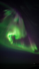 Coronal Aurora Borealis falling down from the sky. 
