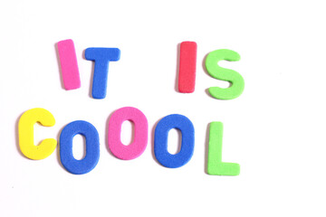 It is cool phrase lettering, colored letters on white