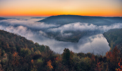 fog in the canyon. Autumn morning in the Dniester river valley. Nature of Ukraine