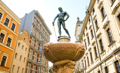 View of Fencer Fountain on urban street