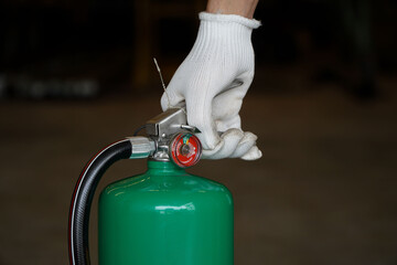 Training on the use of green fire extinguishers in industrial plants