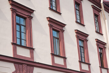 View of the facade of the house with windows.