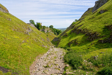 Down the steep rock covered path in Cave Dale