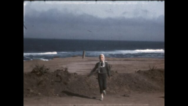 Running to the Camera 1967 - A girl runs toward the camera at San Gregorio State Beach in California, 1967. 