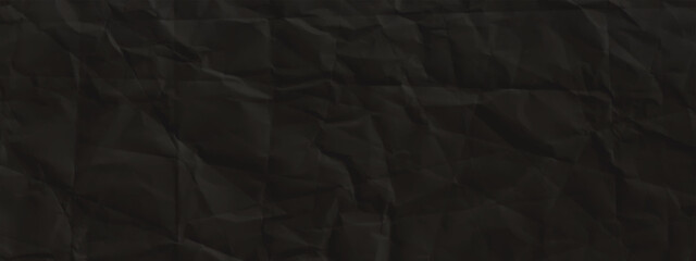 Black creased paper background texture. Black paper sheet.