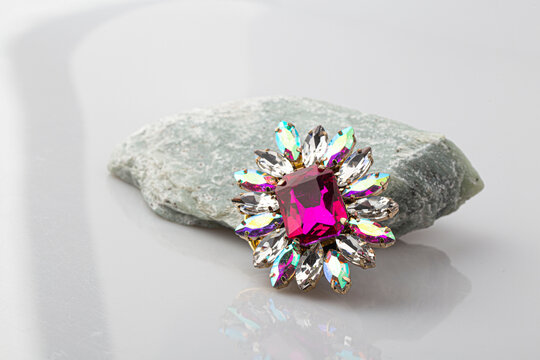 antique brooch purple stone on white background.