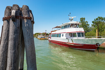 Two ferries moored in the port of the Torcello Island, Venetian lagoon, Venice, UNESCO world...