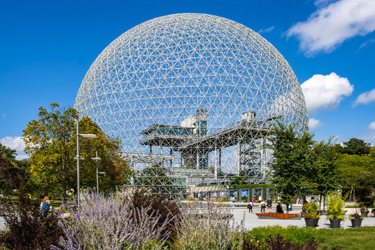 Montreal, Quebec / Canada - August 27, 2022: Montreal Biosphere on St. Helen's Island, a geodesic dome designed by Buckminster Fuller. The former pavilion of the United States for the 1967 World Fair.
