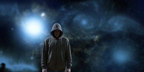 Fototapeta premium Silhouette of man in hoody on space and stars background