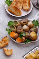 Baked snails Escargot with bread