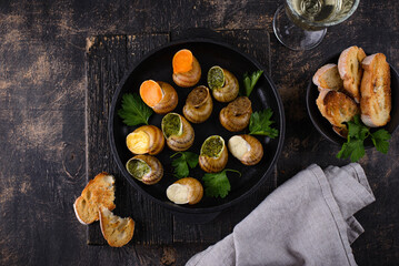 Baked snails Escargot with bread