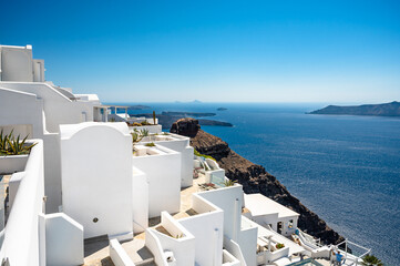 Obraz premium White architecture on Santorini island, Greece. Beautiful view on the blue sea and sky. 