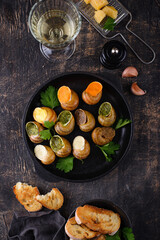 Baked snails Escargot with bread