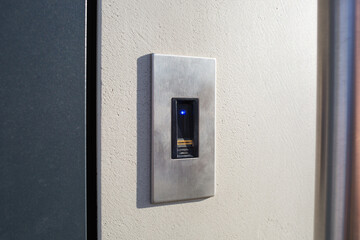 biometric lock. opening front door of house by fingerprint. modern smart digital technologies