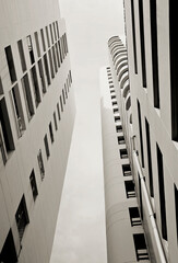 Urban high rise neutral gray condo, modern flat cosmopolitan residential buildings structure abstract background.