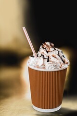 Chocolate milkshake with cream in glass