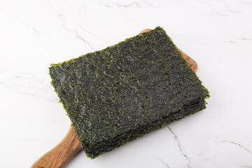 Korean seaweed on a chopping board. laver © bong