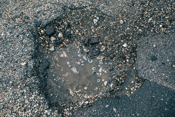 A pothole on asphalt road