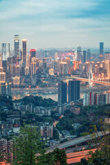 Obraz premium Overlooking the night view of modern buildings in Chongqing Financial Center