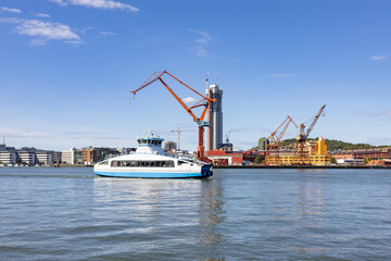 Naklejka premium Crane and Ship in Gothenburg harbour, Sweden, Scandinavia, Europe