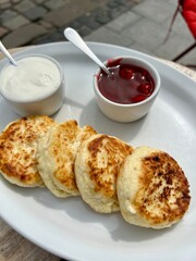 cottage cheese pancakes with sour cream and jam