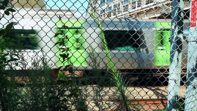 Shibuya, Tokyo, Japan - Rusty Fence and Train
