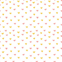 Tiny yellow and pink hearts seamless pattern.