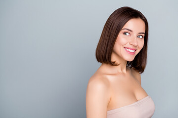 Fototapeta premium Photo of joyful lady look empty space new spa salon opening advert isolated over grey color background