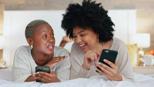 Friends, phone and laugh in house bedroom, home interior or relax hotel with social media technology for dating app profile search. Smile, happy and comic women with mobile for fun communication