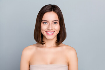 Portrait of gorgeous smiling female with bob hairstyle showing bright teeth have nude makeup...