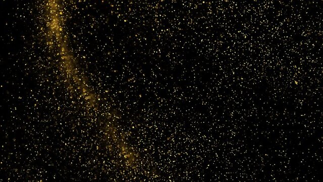 Gold dust particles fly in slow motion in the air lingering slowly. Dust Particles Background Bokeh Lights Background on Black Background 4k Footage Snow Particles Background.