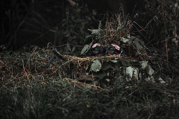 Eastern special forces soldier with rifle in woodland