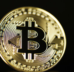 Bitcoin (Cryptocurrencys new digital money) on background