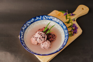 Tapai of black glutinous rice in a bowl.