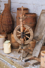 Authentic kitchenware in the house in the rustic style. Installation in museums of traditional rural household items..